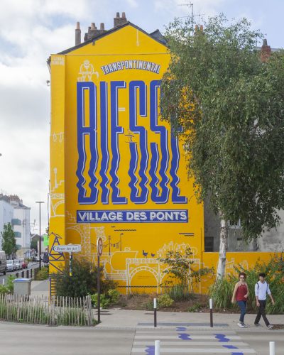 rue biesse mur jaune Biesse peinture en lettres signaletique urbaines nantes samoa iles de nantes maison maj